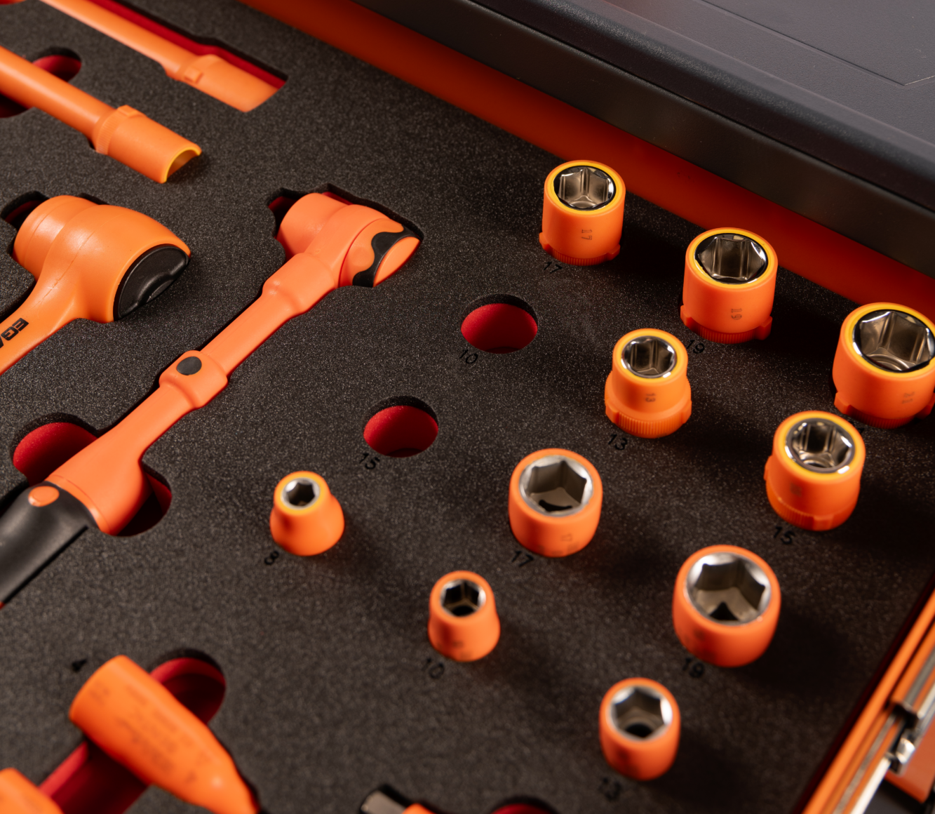 Insulated high voltage safety equipment toolset in a case.